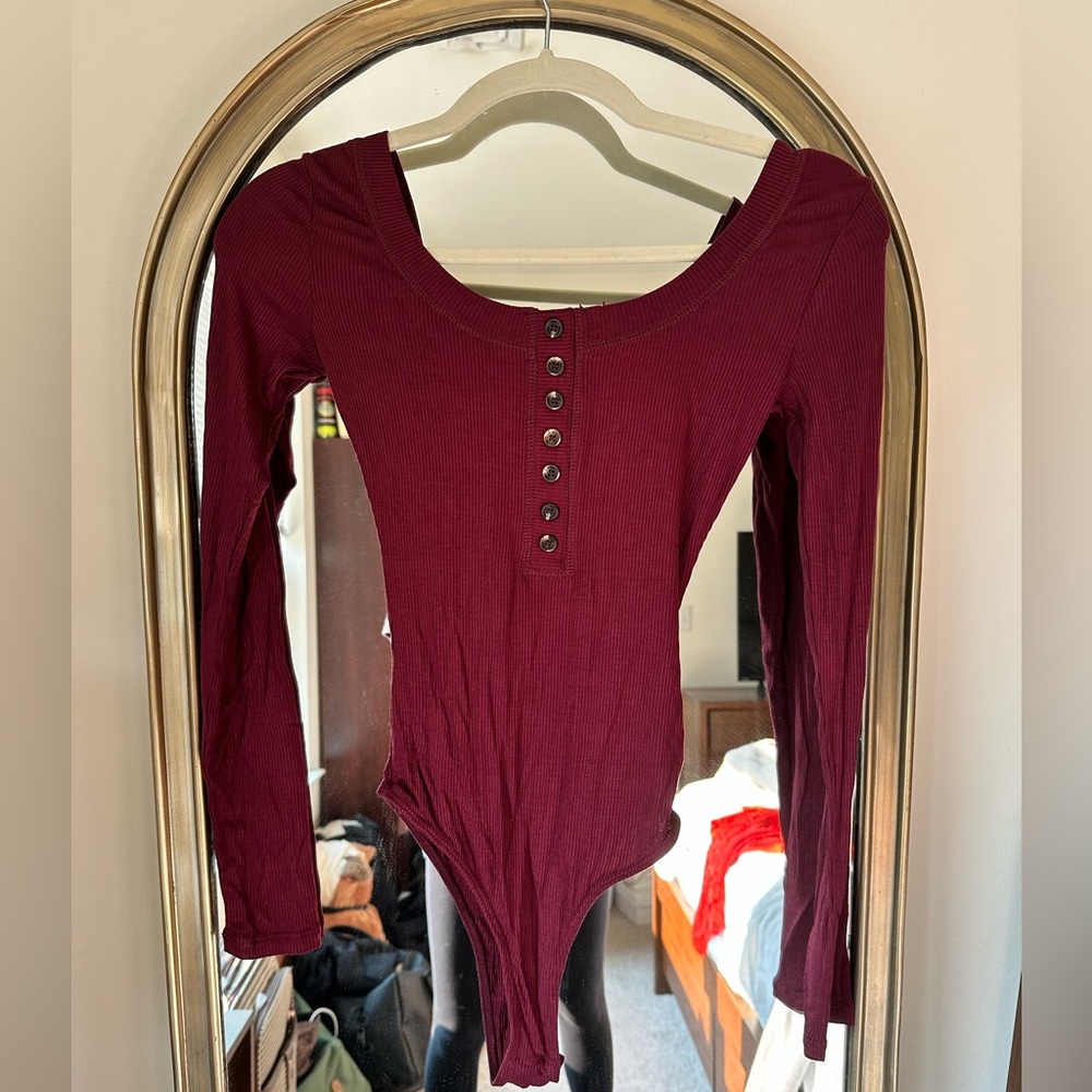 Lulu’s Simply the Best Long Sleeve Button-Front Bodysuit